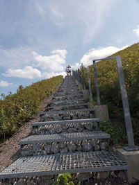 Low angle view of steps against sky