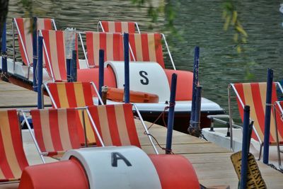 Chairs and table by lake