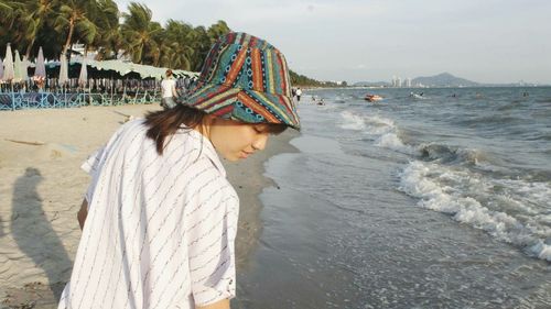 Woman standing on beach