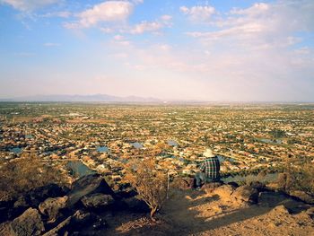 Aerial view of cityscape against sky