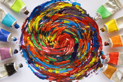 High angle view of multi colored umbrellas on table