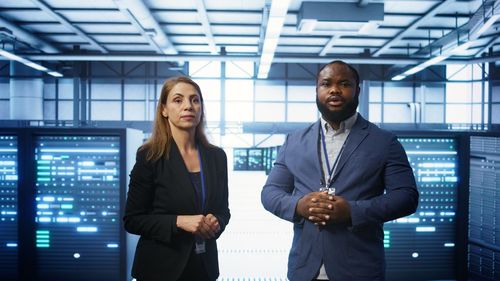 Portrait of business colleagues standing in office