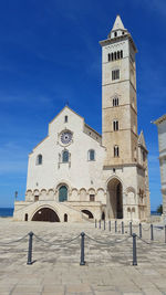 Low angle view of building against blue sky