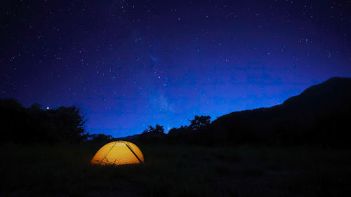 Scenic view of star field against sky at night