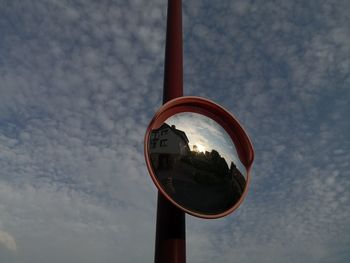 Low angle view of pole against sky