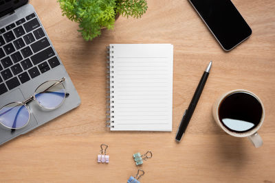 High angle view of coffee cup on table