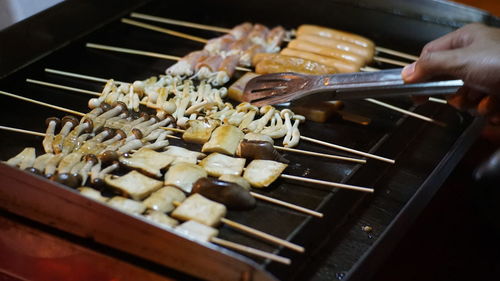 Midsection of person preparing food