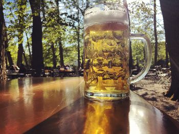 Close-up of beer glass on table