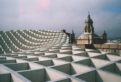 Architectural column against sky