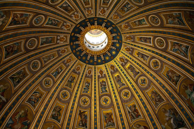 Low angle view of illuminated ceiling of cathedral