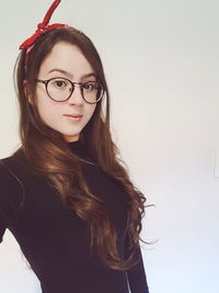 Portrait of young woman in eyeglasses