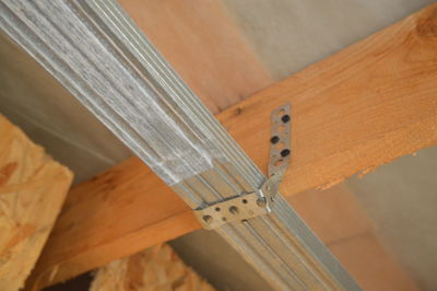 High angle view of piano keys on wooden table