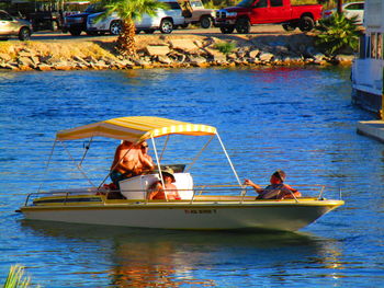 People on boat in sea