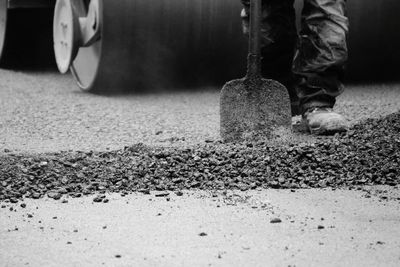 Low section of men working on road