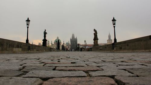 View of street against sky in city