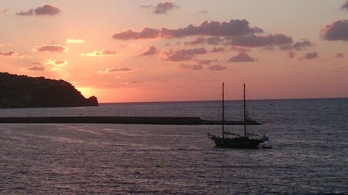 Scenic view of sea at sunset