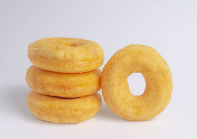 Close-up of donuts against white background