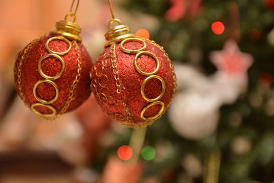 Close-up of christmas decoration hanging against blurred background