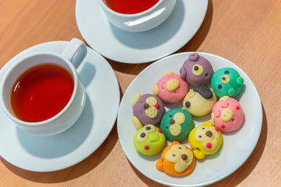 High angle view of coffee served on table