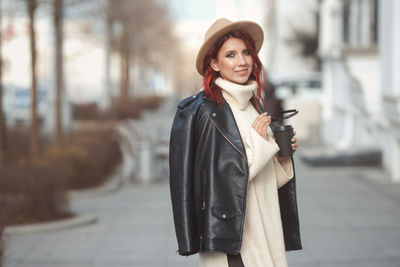 Young woman standing outdoors