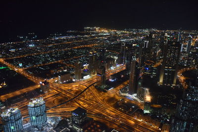 High angle view of illuminated cityscape at night