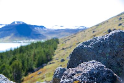 Rocks on mountain against sky
