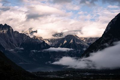 Scenic view of snowcapped mountains against sky