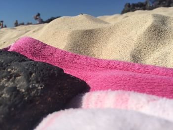 Close-up of sand dune at beach