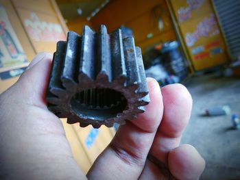 Close-up of hand holding ice cream