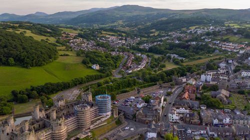 High angle view of townscape and mountains