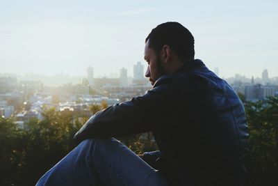 Woman looking at cityscape