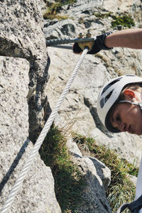 Portrait of man on rock