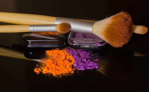 Close-up of beauty products on table