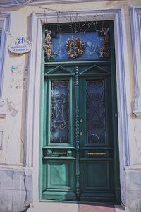 Low angle view of closed door of building