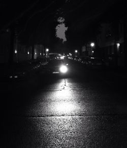 Illuminated street lights at night