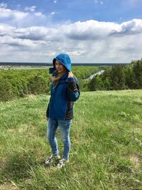 Full length of man on field against sky