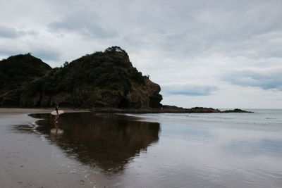 Scenic view of beach against sky