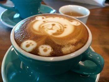 Close-up of cappuccino on table