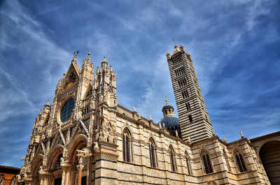 Low angle view of historical building against sky