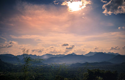 Scenic view of mountains against sky during sunset