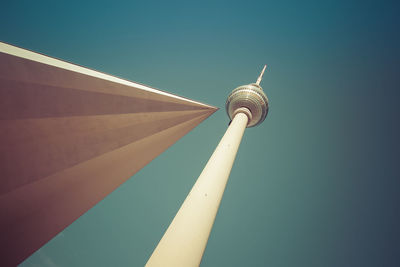 Low angle view of berlin tv tower against clear sky