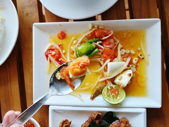 High angle view of food served on table