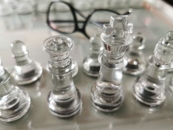 Close-up of chess pieces on table