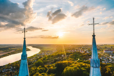 Aerial view of church against sky during sunset