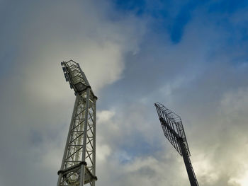 Low angle view of crane against sky