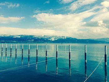 Scenic view of sea against cloudy sky