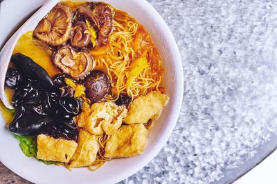 Directly above shot of noodles in bowl on table