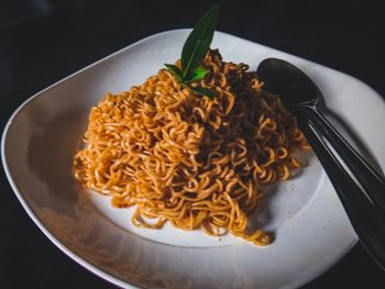 High angle view of noodles in plate on table