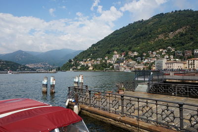 Scenic view of lago di como and mountains against sky