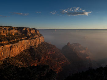 Scenic view of rock formations against sky